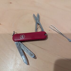 Victorinox Red Multi-Tool with Scissors and Tweezers